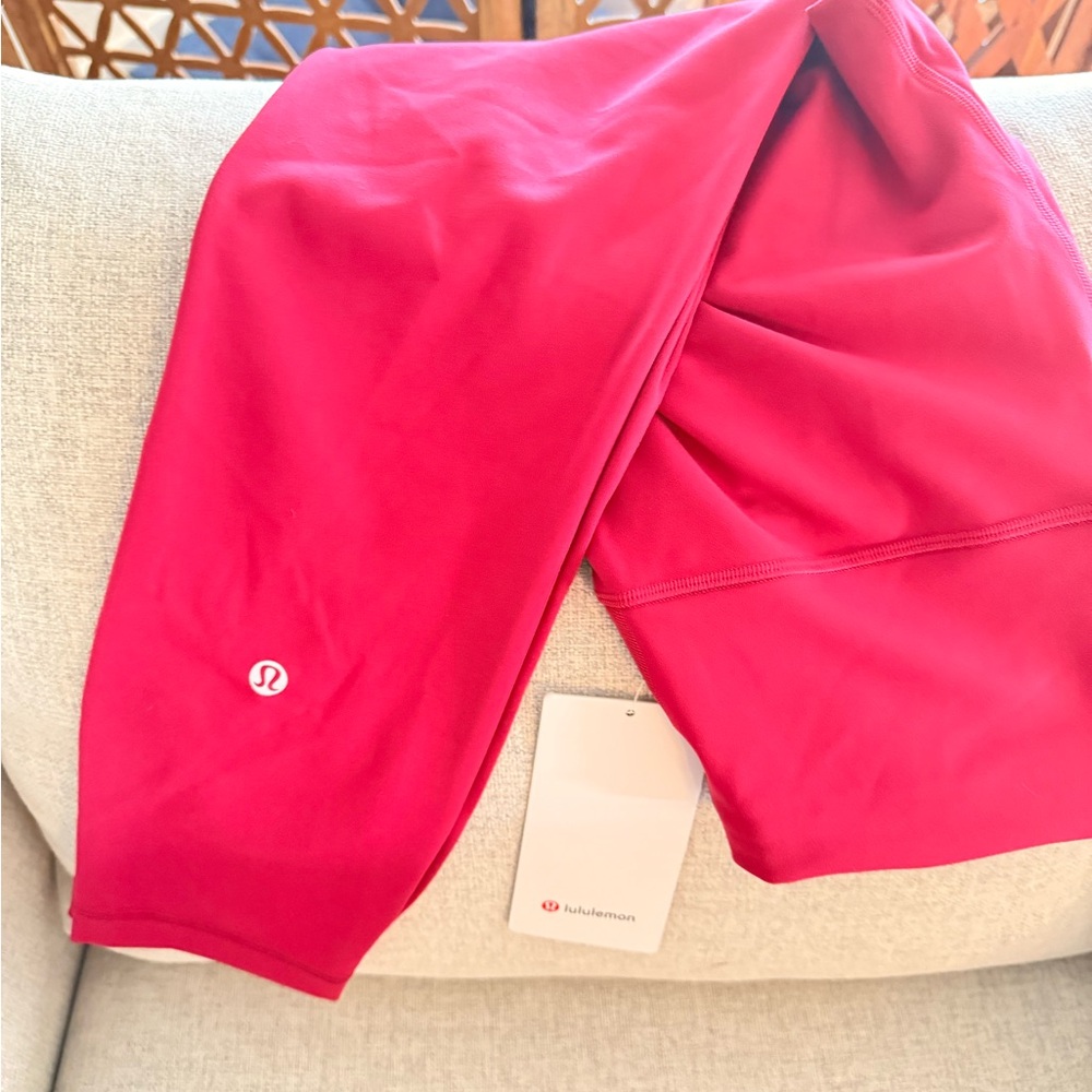 Raspberry Lululemon Wunder Train Leggings
Size 8